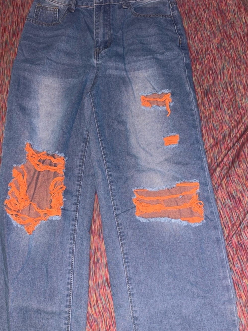 Women’s Blue Distressed Jeans with Orange Patch Details